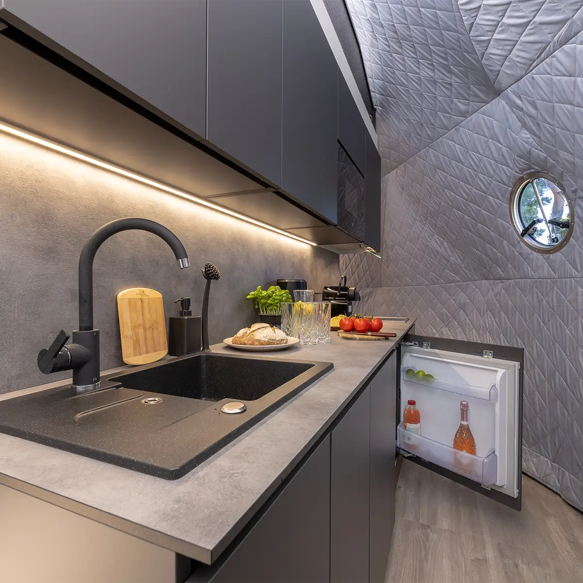 Welcome drink — sparkling wine, fresh bread and tomatoes in the dome fridge