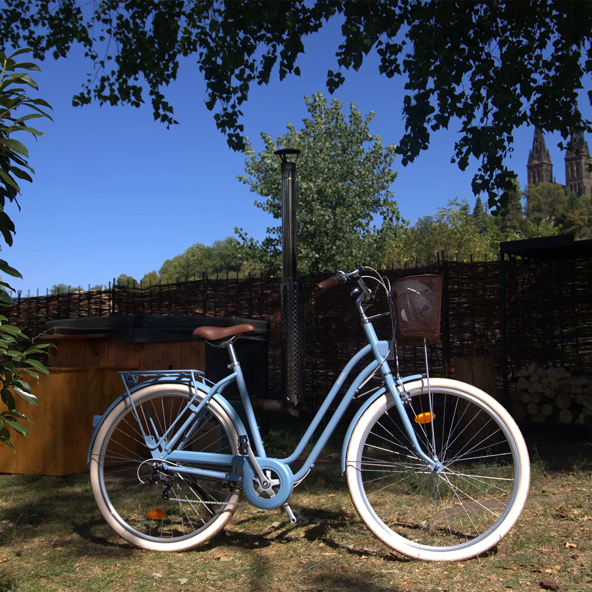 Cruiser bicycle parked by the deck — ten minutes to Wenceslas Square